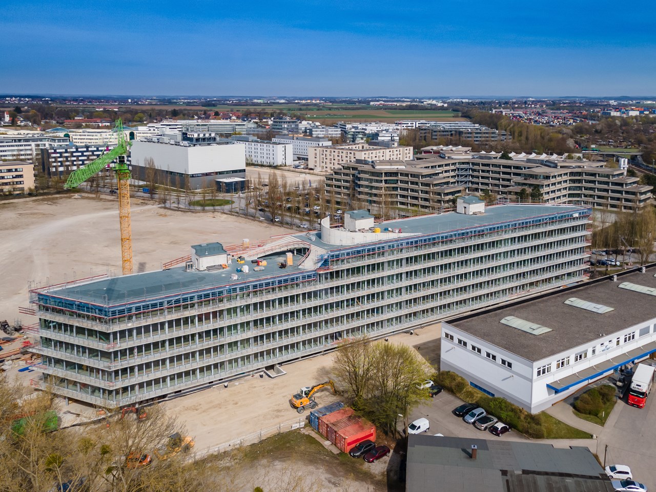 Hammerschmidt - Bürogebäude mit Dachterrasse und offenem Parkdeck - Pozemní stavby Hammerschmidt - Bürogebäude mit Dachterrasse und offenem Parkdeck - Pozemní stavby